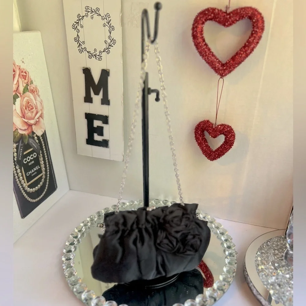 White House black market Chic Black Satin Clutch with Rosette Accent